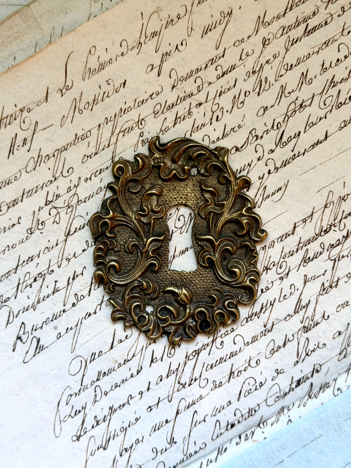 French Escutcheon: Scrolling