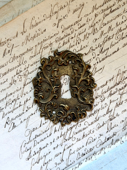 French Escutcheon: Scrolling